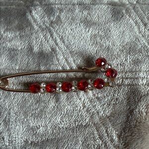 Elegant Red and Gold Brooch